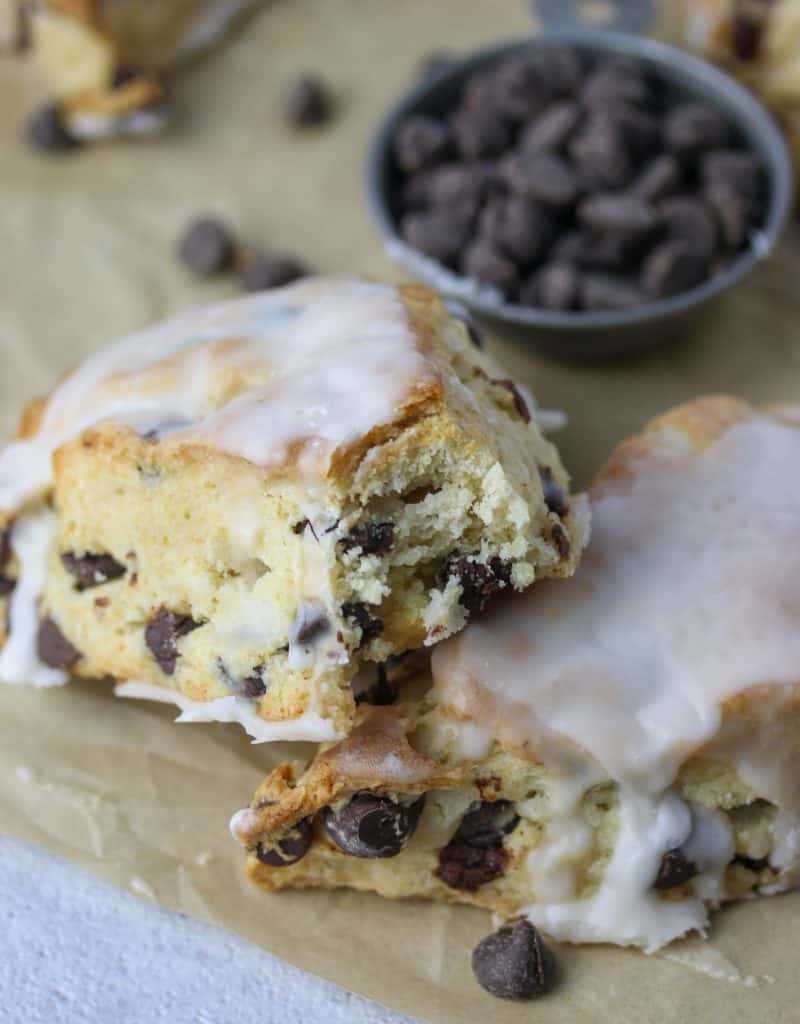 chocolate chips scones, one with a bite taken out of it