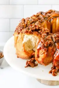 overnight monkey bread on a cake stand
