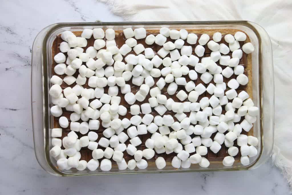 marshmallows on top of the s'mores bar untoasted