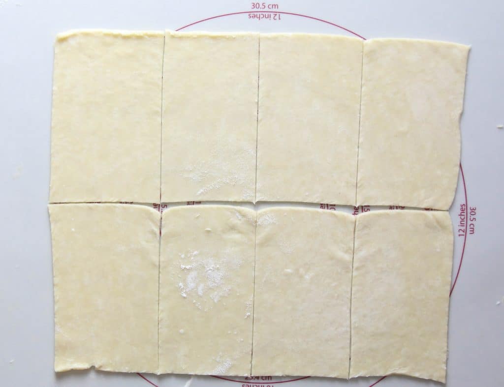 dough cut into 12 by 10 inch rectangle and then into eight individual rectangles