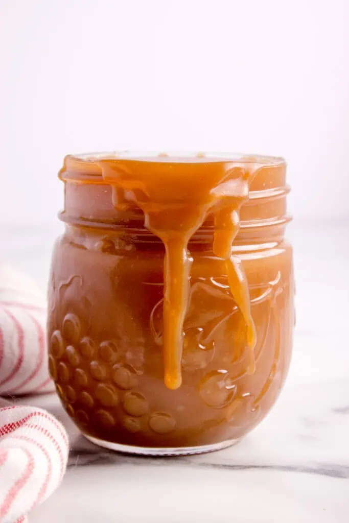 How To make salted caramel sauce glass jar of caramel sauce