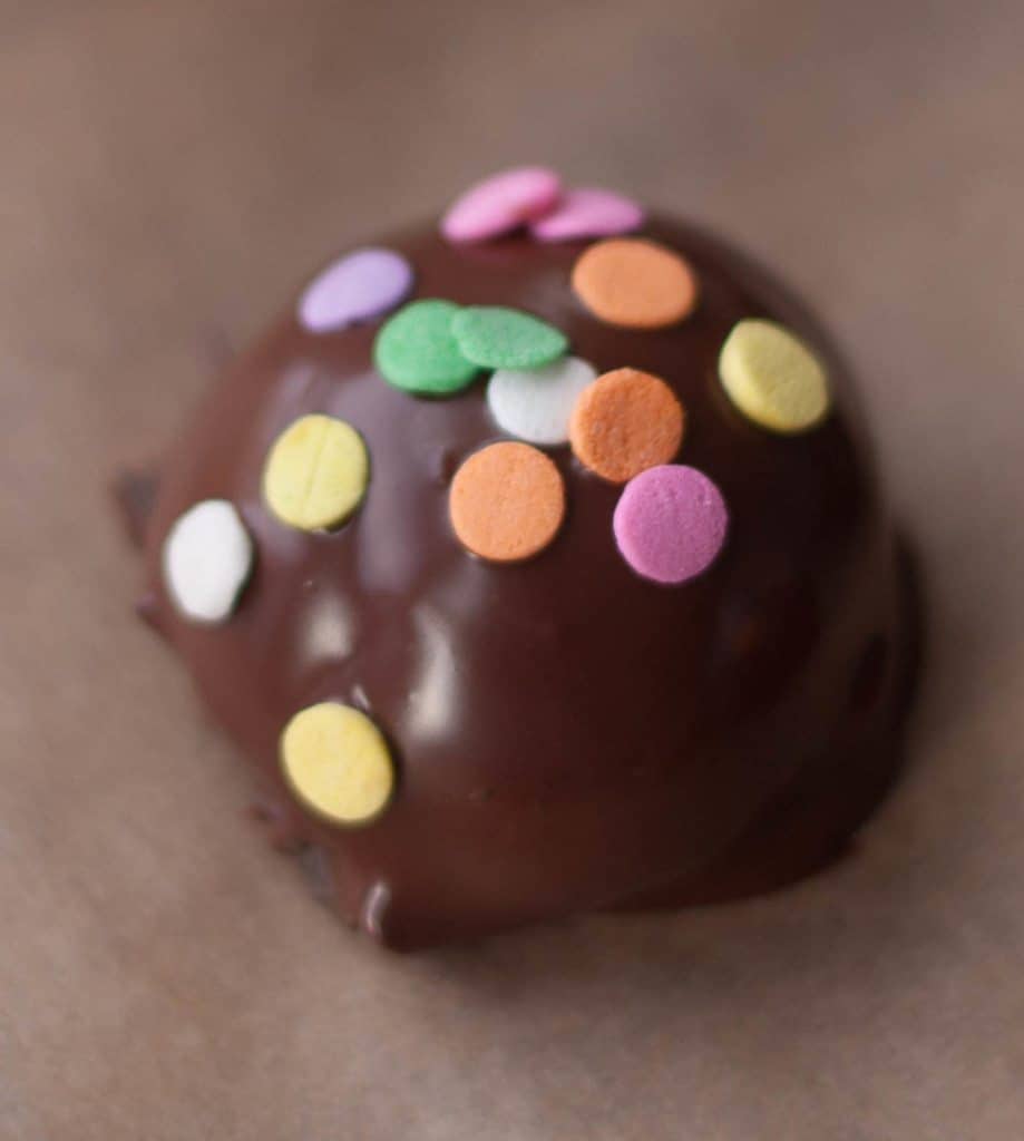 smooth peanut butter oreo truffle with sprinkles