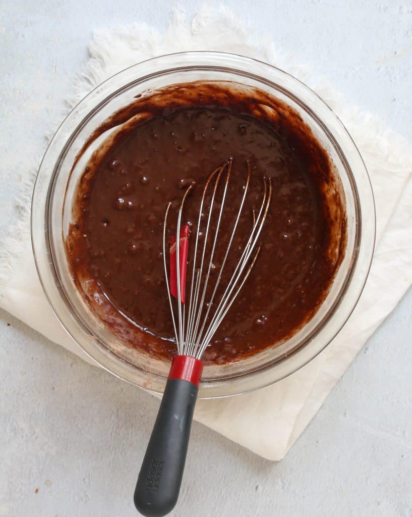 hostess cupcake batter in a mixing bowl with a whisk