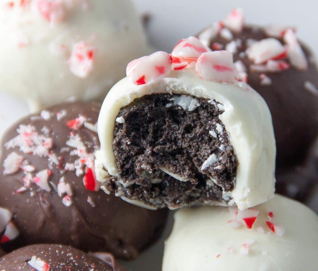 peppermint oreo truffle with a bite taken out of it