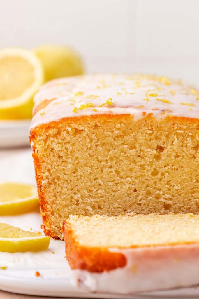 lemon bread loaf with first slice sliced