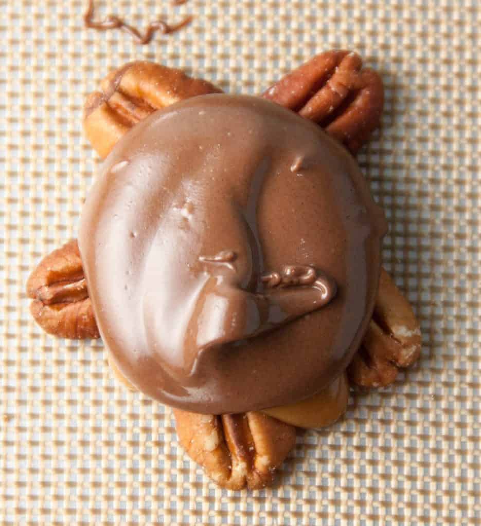 caramel turtle on a cookie sheet