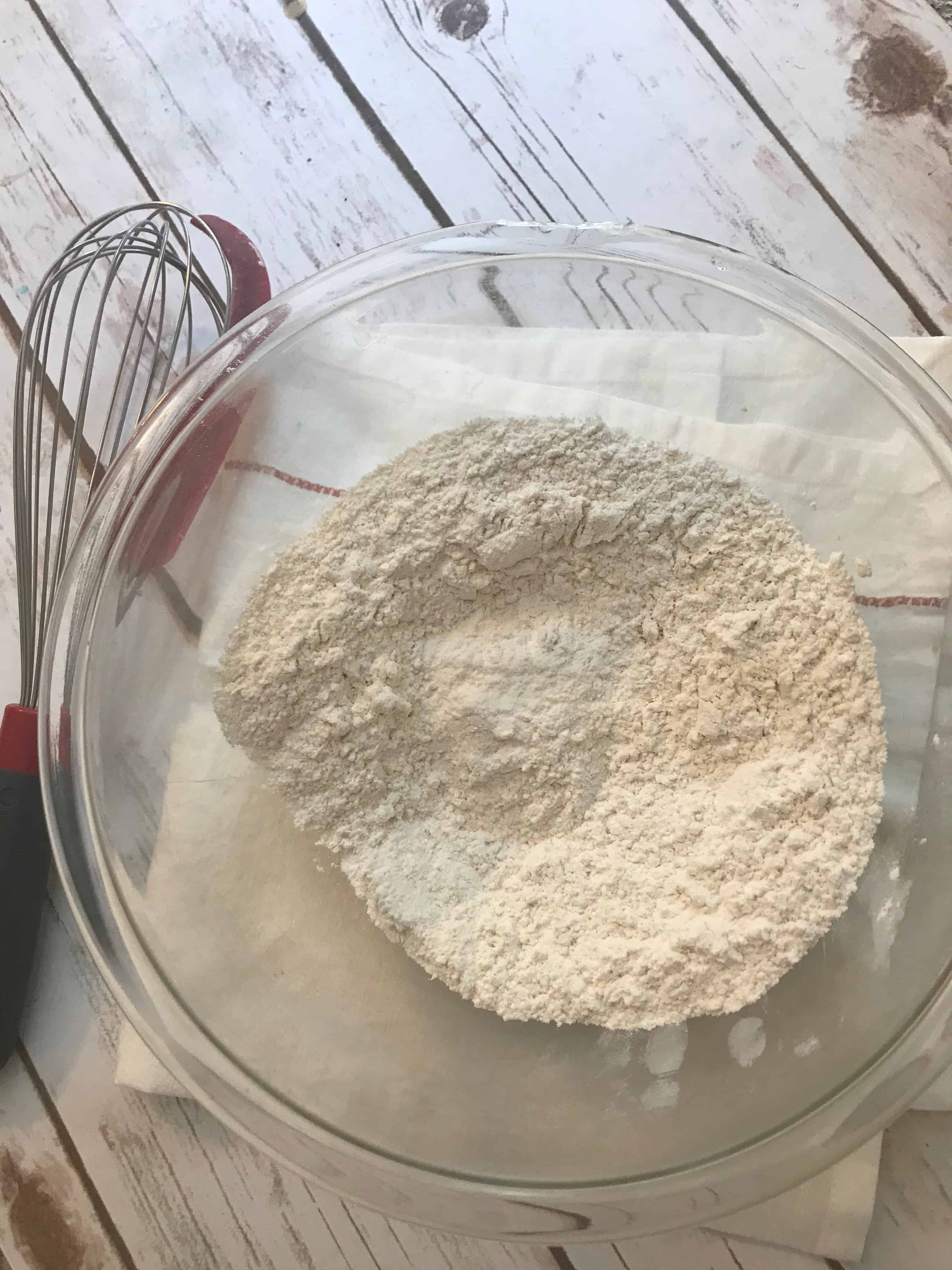 bowl of dry ingredients and a whisk