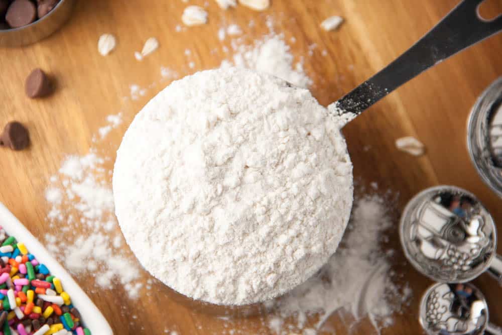 flour in a measuring cup