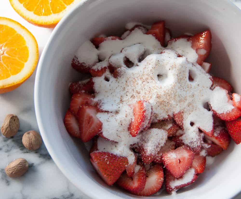 strawberries and sugar in a bowl