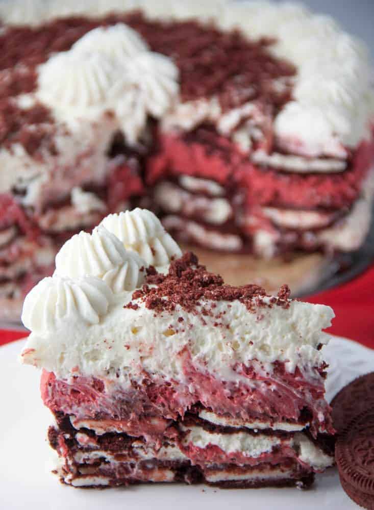 slice of no bake red velvet cheesecake on a plate