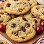 cherry chocolate chip cookies on a cutting board