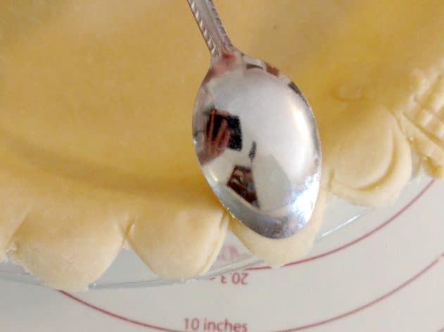 Pie crust edge crimped with a spoon
