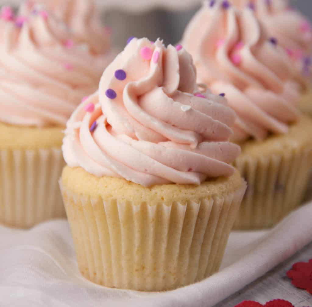 vanilla cupcake with pink frosting