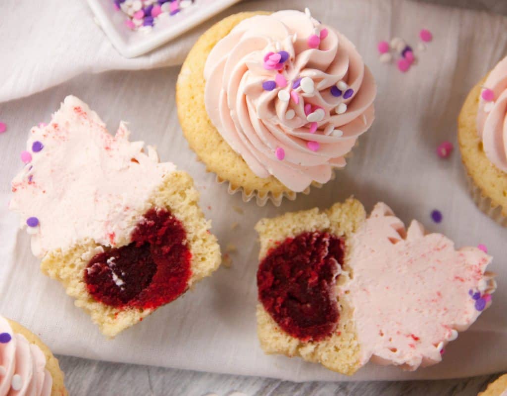 Learn how to make these heart surprise inside cupcakes!
