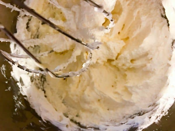 swiss meringue buttercream in mixer bowl