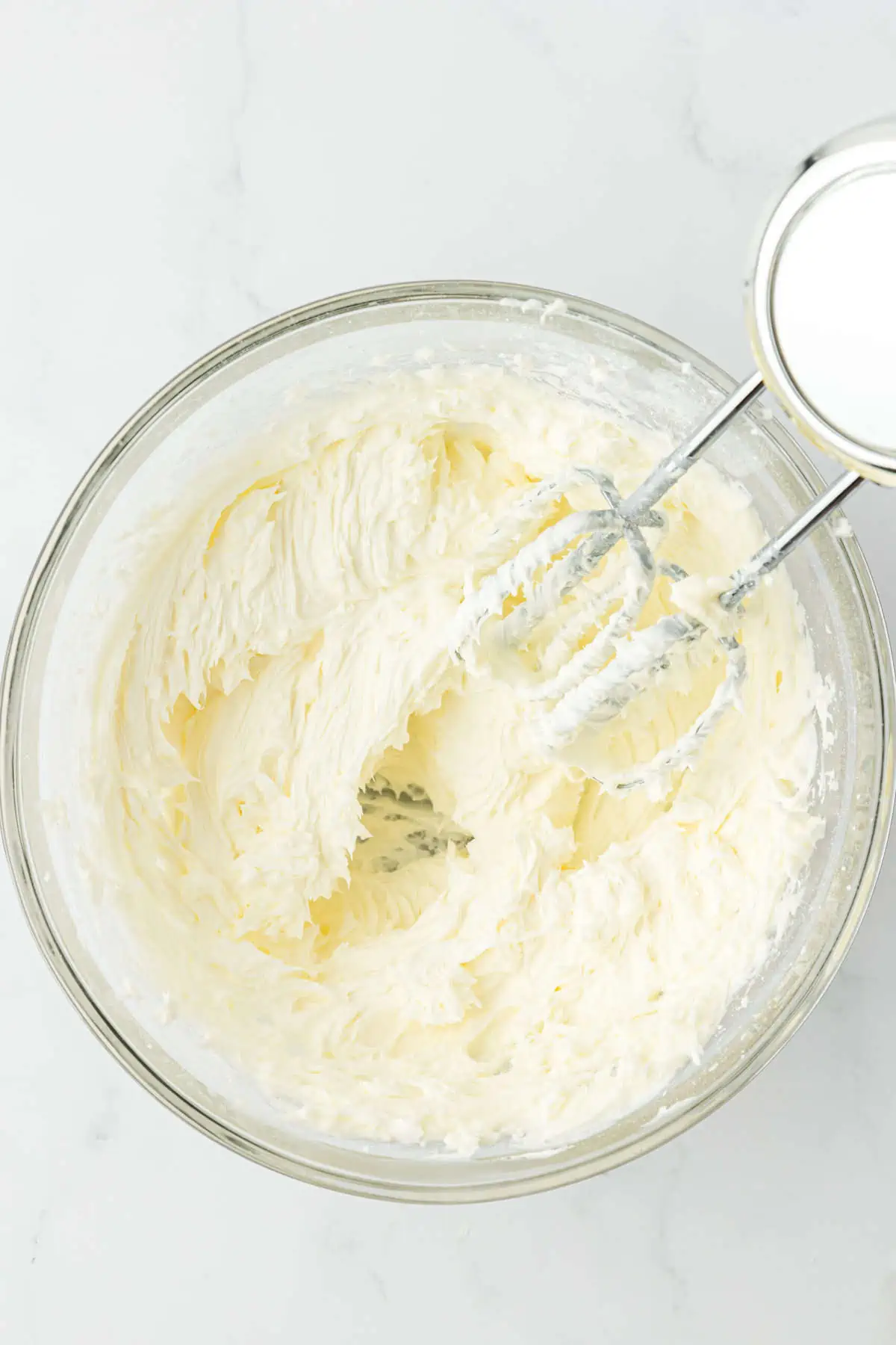 butter and powdered sugar beaten together in bowl