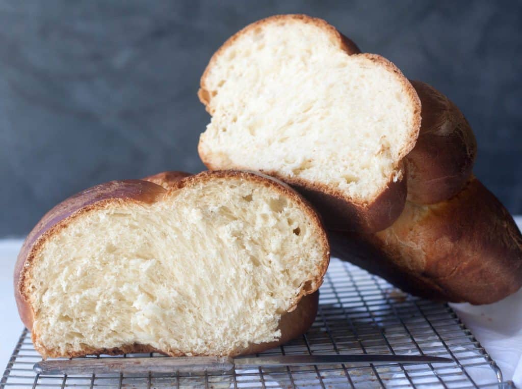 challah bread loaf cut in half