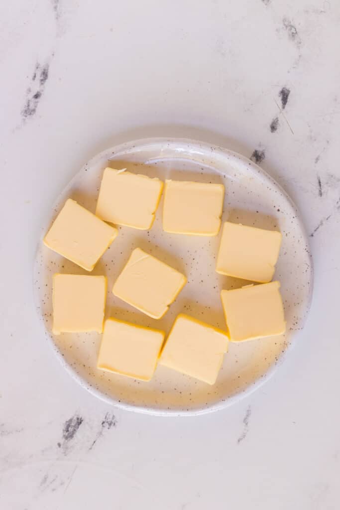 plate of sliced butter chunks