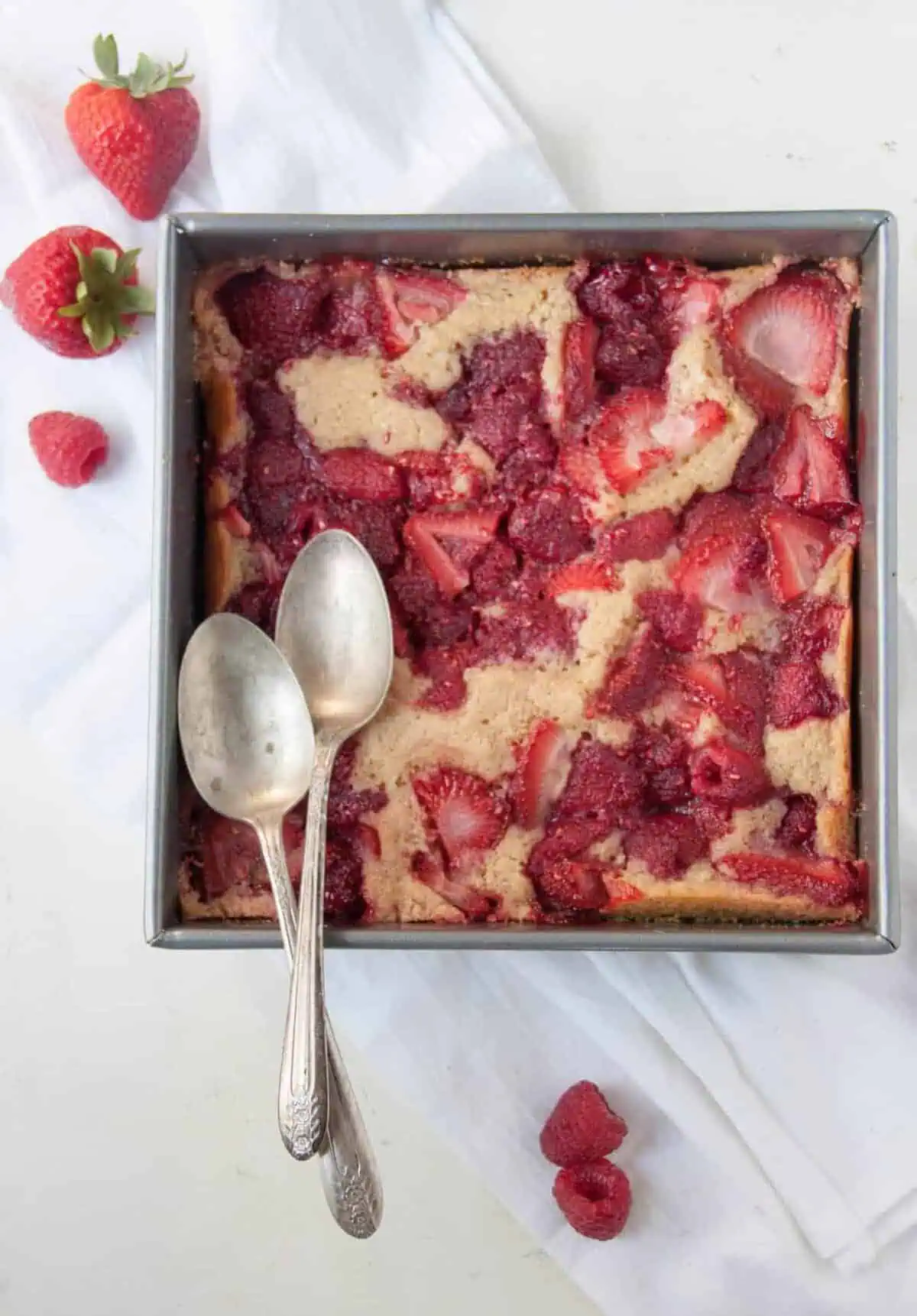 strawberry raspberry cobbler with two spoons