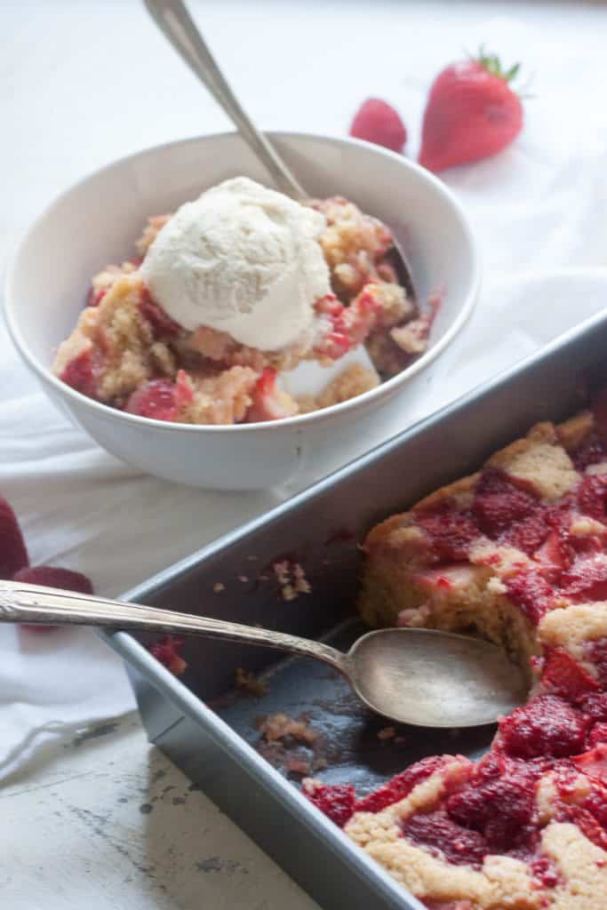 bowl of berry cobbler with ice cream