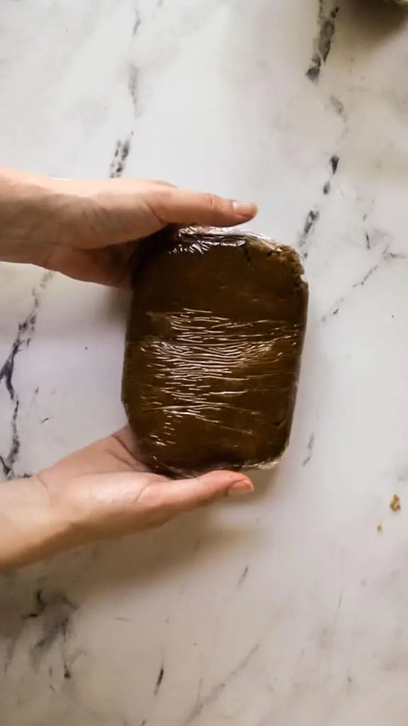 gingerbread cookie dough wrapped in plastic
