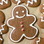 decorated gingerbread man cookie on a baking sheet