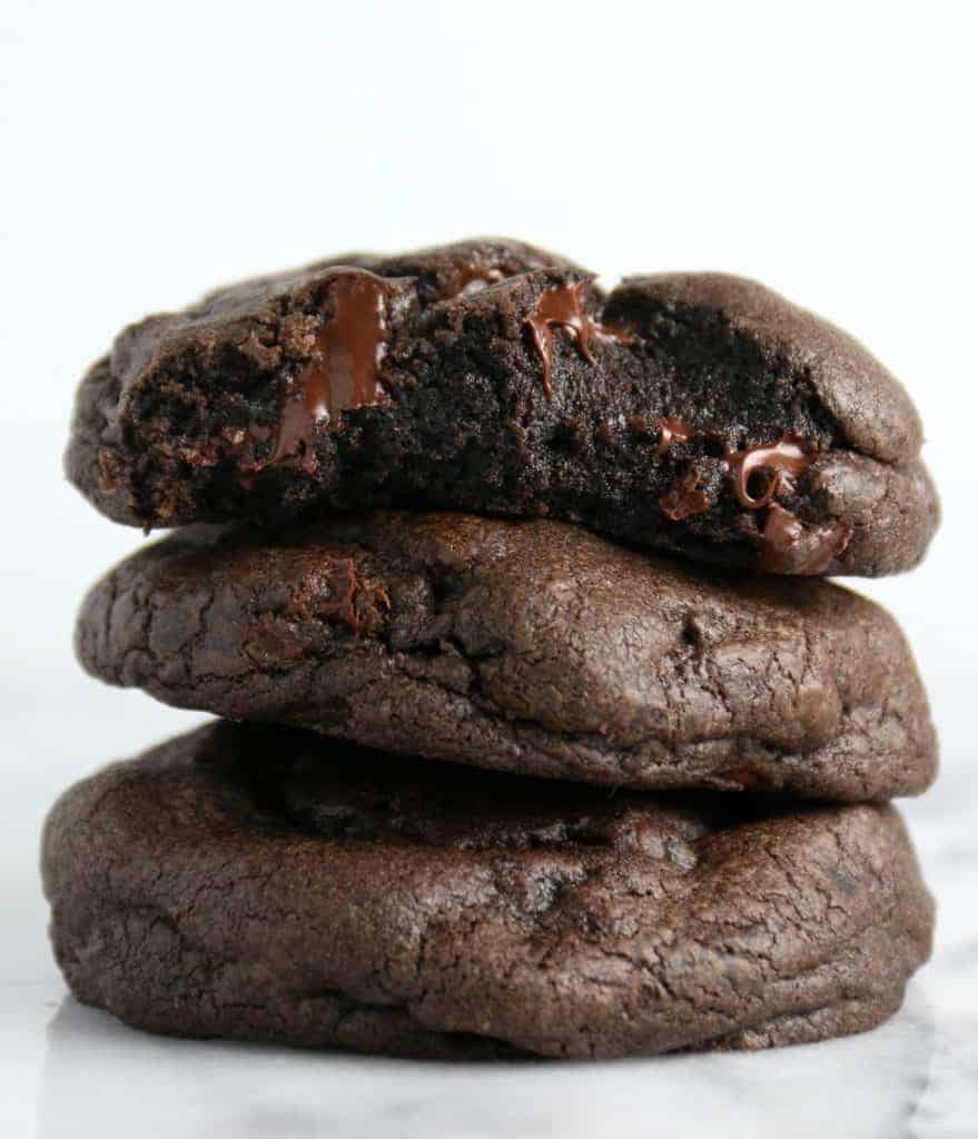 three double chocolate cookies stacked on top of each other