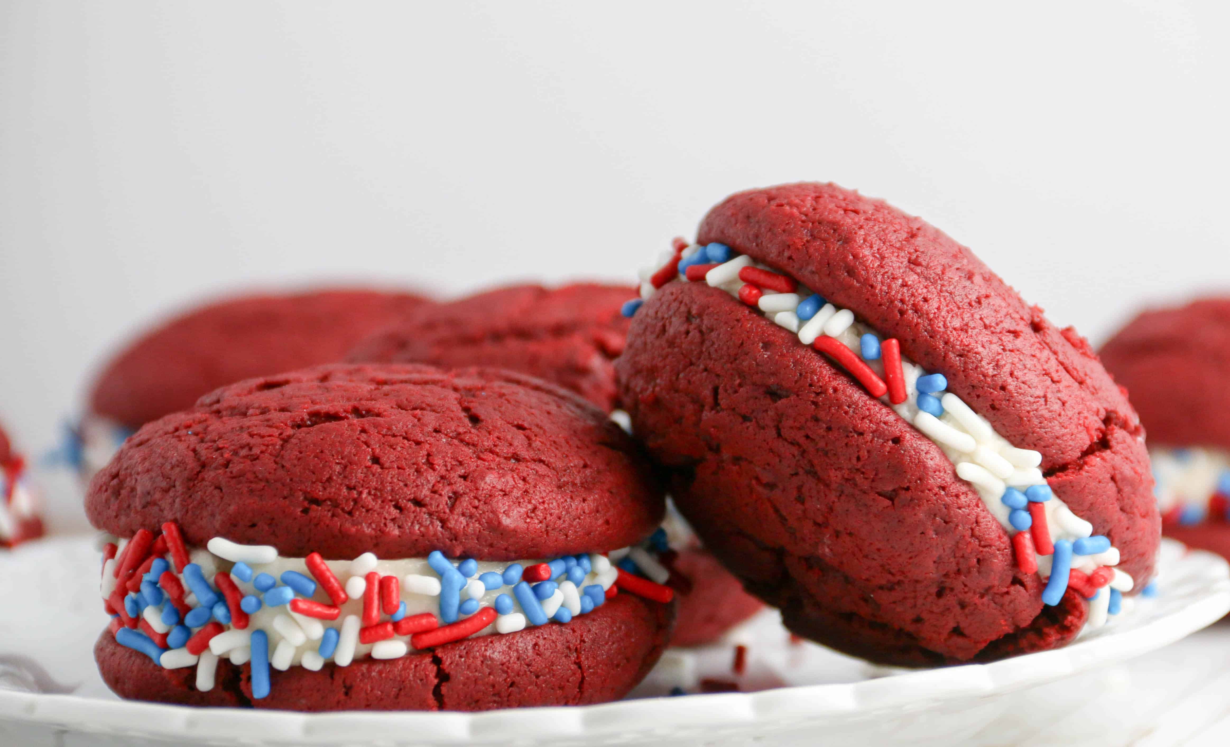 2 red velvet whoopie pies on a plate