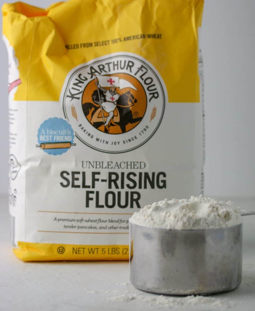 a bag of self-rising flour and a cup of flour