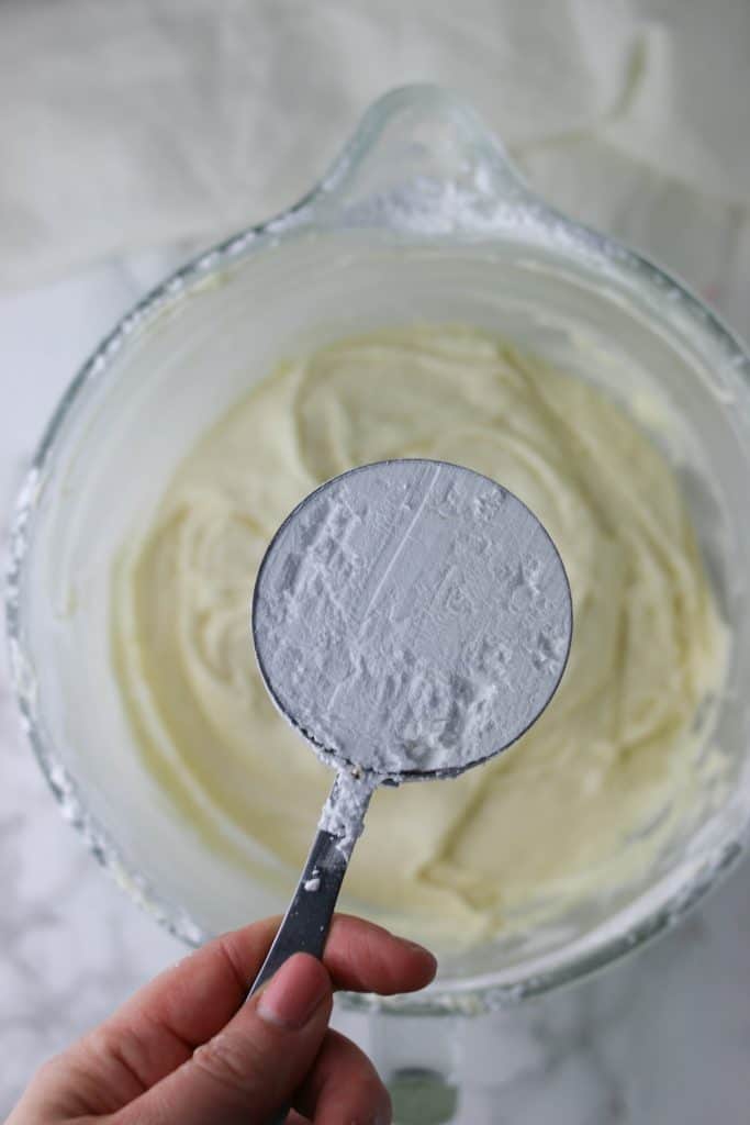 powdered sugar add to cream cheese frosting bowl