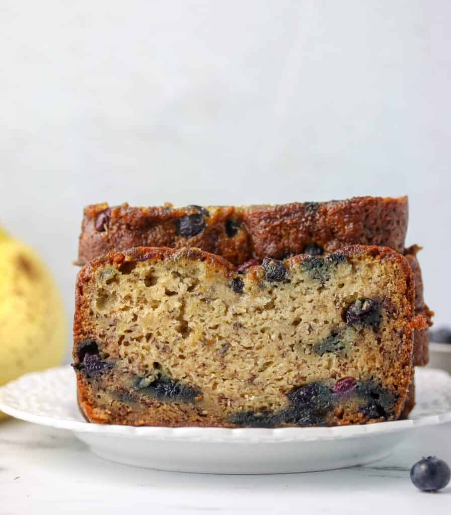 slices of blueberry banana bread on a plate