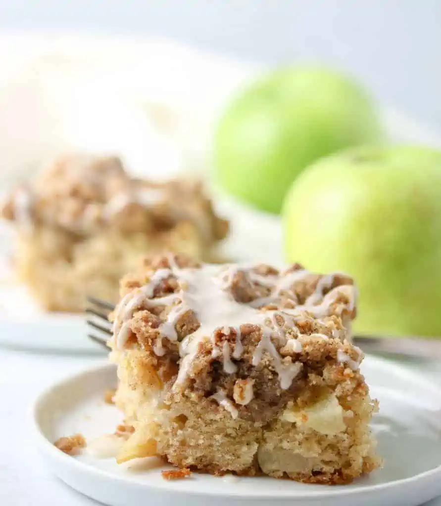 slice of apple crumb cake on a plate