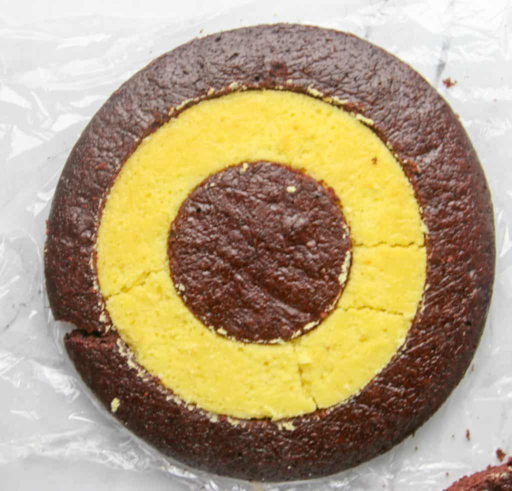 cake layer with alternating circles of chocolate and vanilla cake