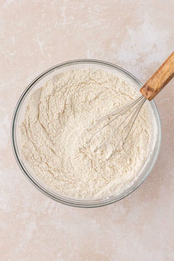 bowl of dry ingredients with a whisk