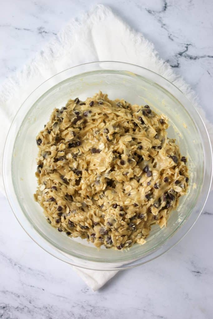 mixing bowl of oatmeal chocolate chip cookie batter