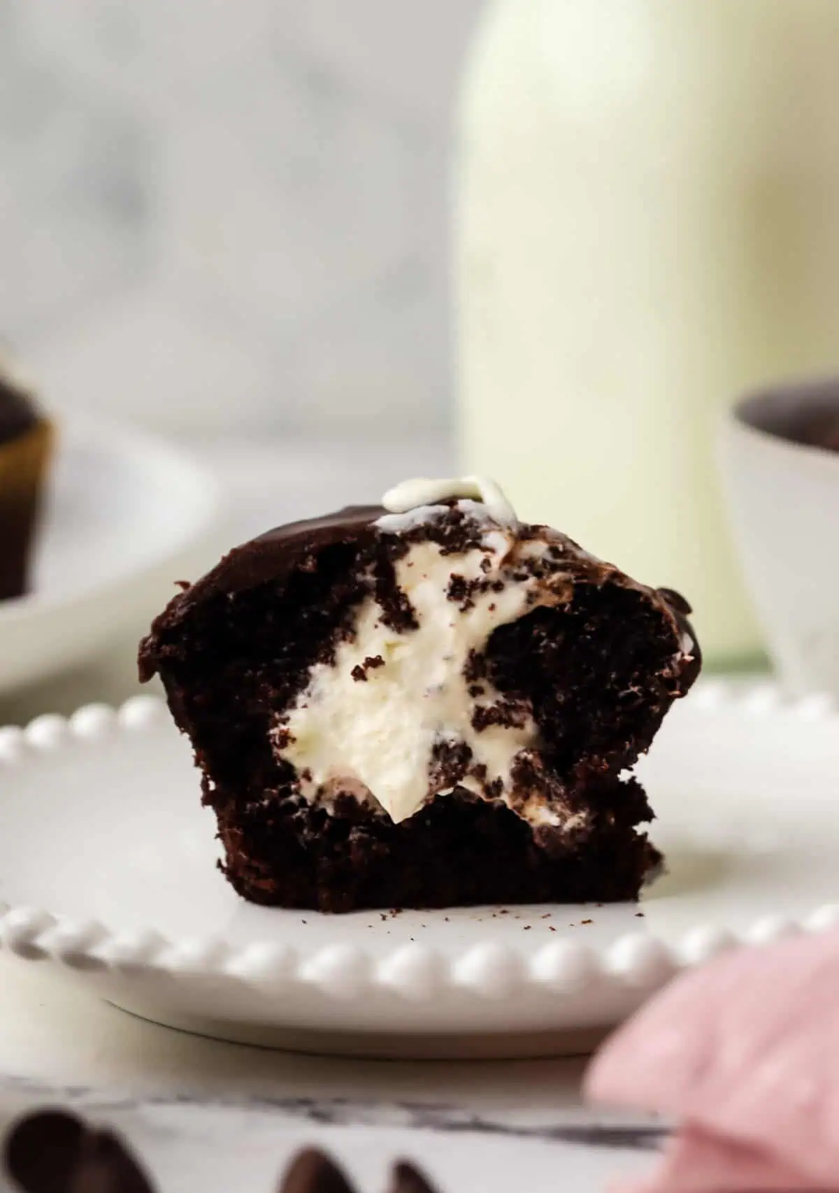 a cupcake cut in half on a plate