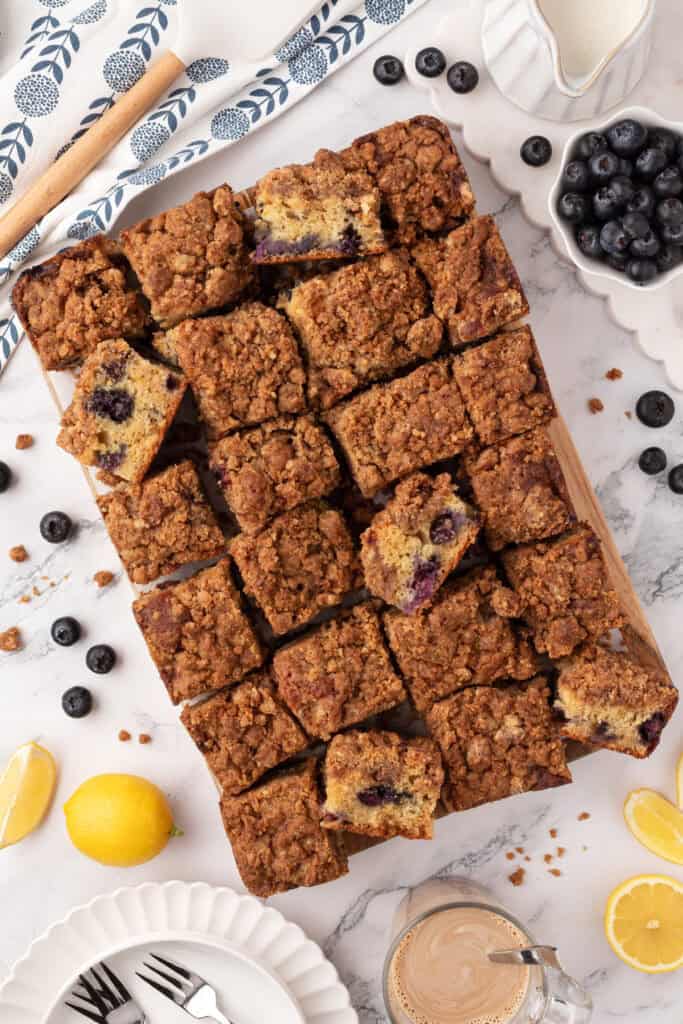 blueberry crumb cake cut into squares
