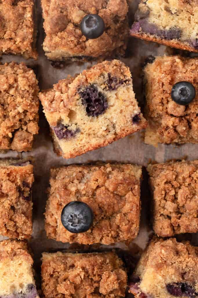 blueberry crumb cake cut into squares
