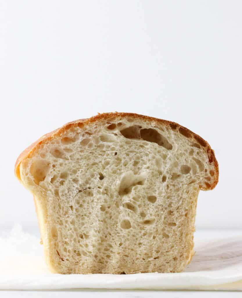 loaf of sourdough sandwich bread cut in half