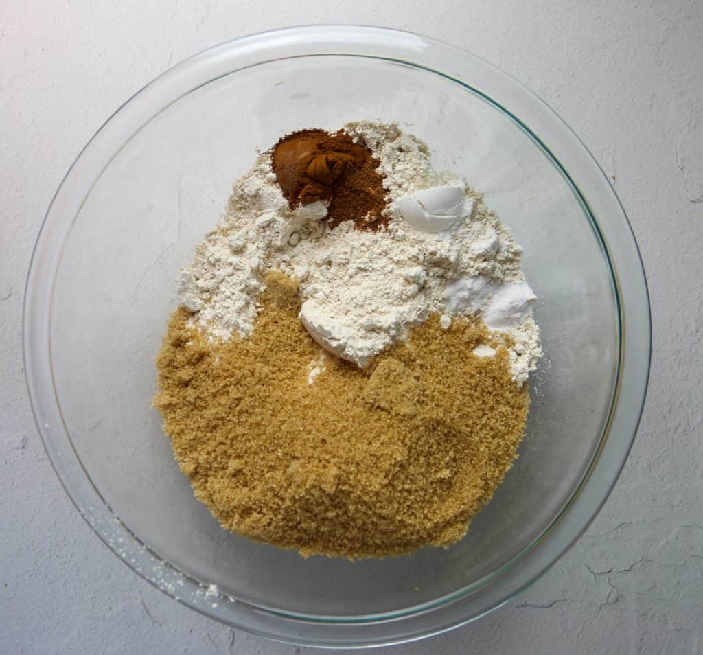 dry ingredients unmixed in a glass bowl for muffins