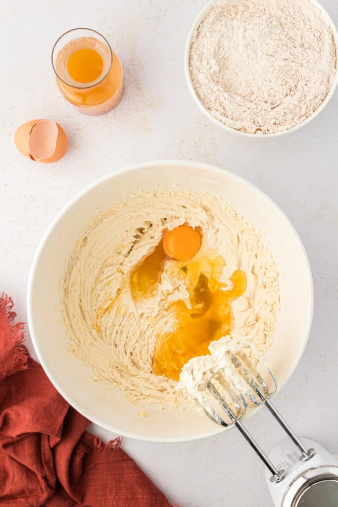 egg and cider added to apple cookie dough