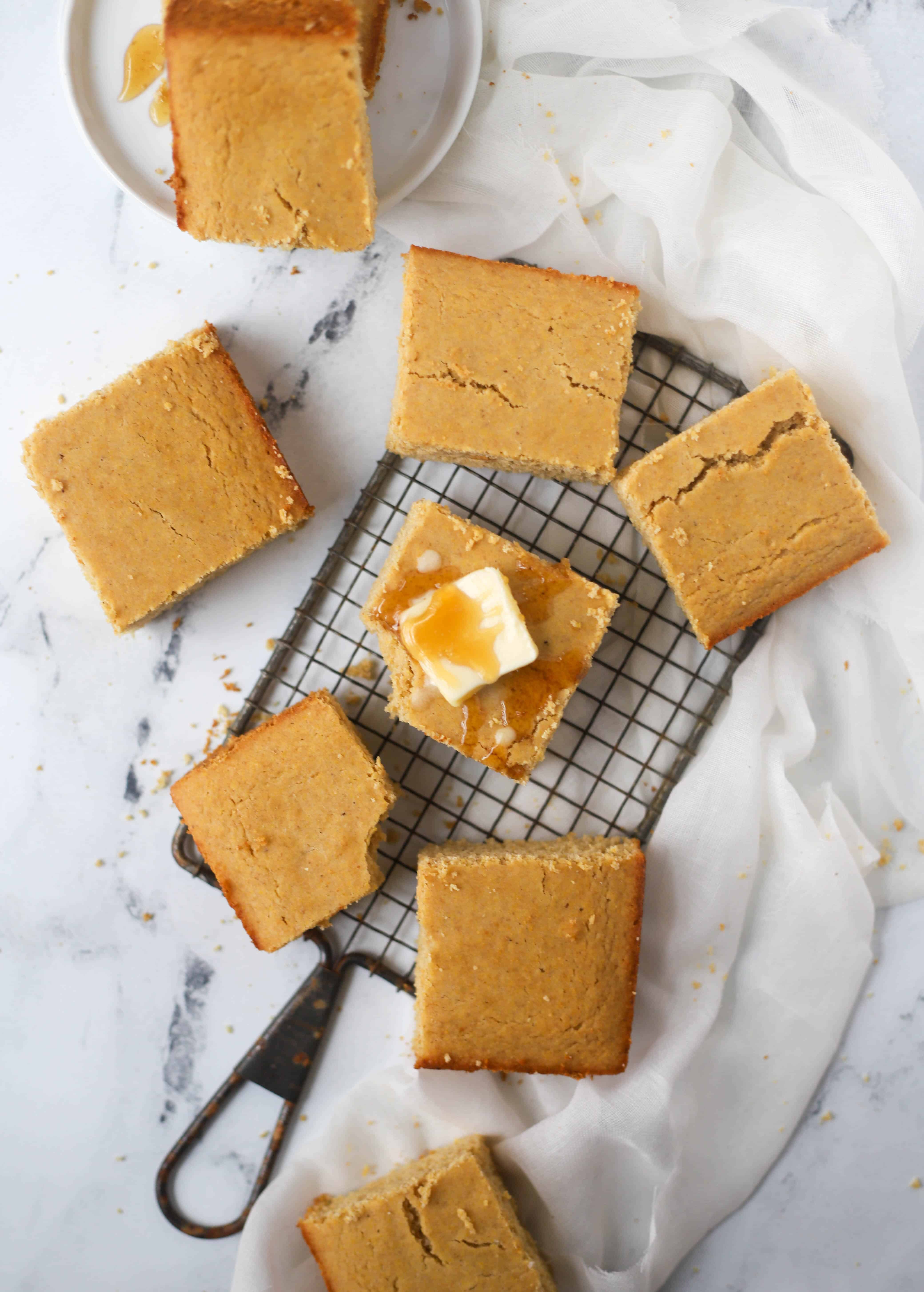 slices of healthy cornbread on a cooling rack