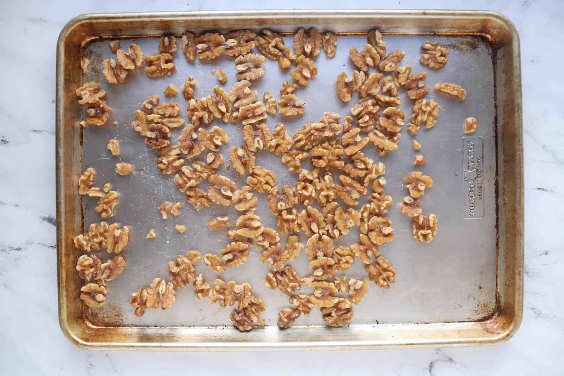 walnuts on a baking sheet
