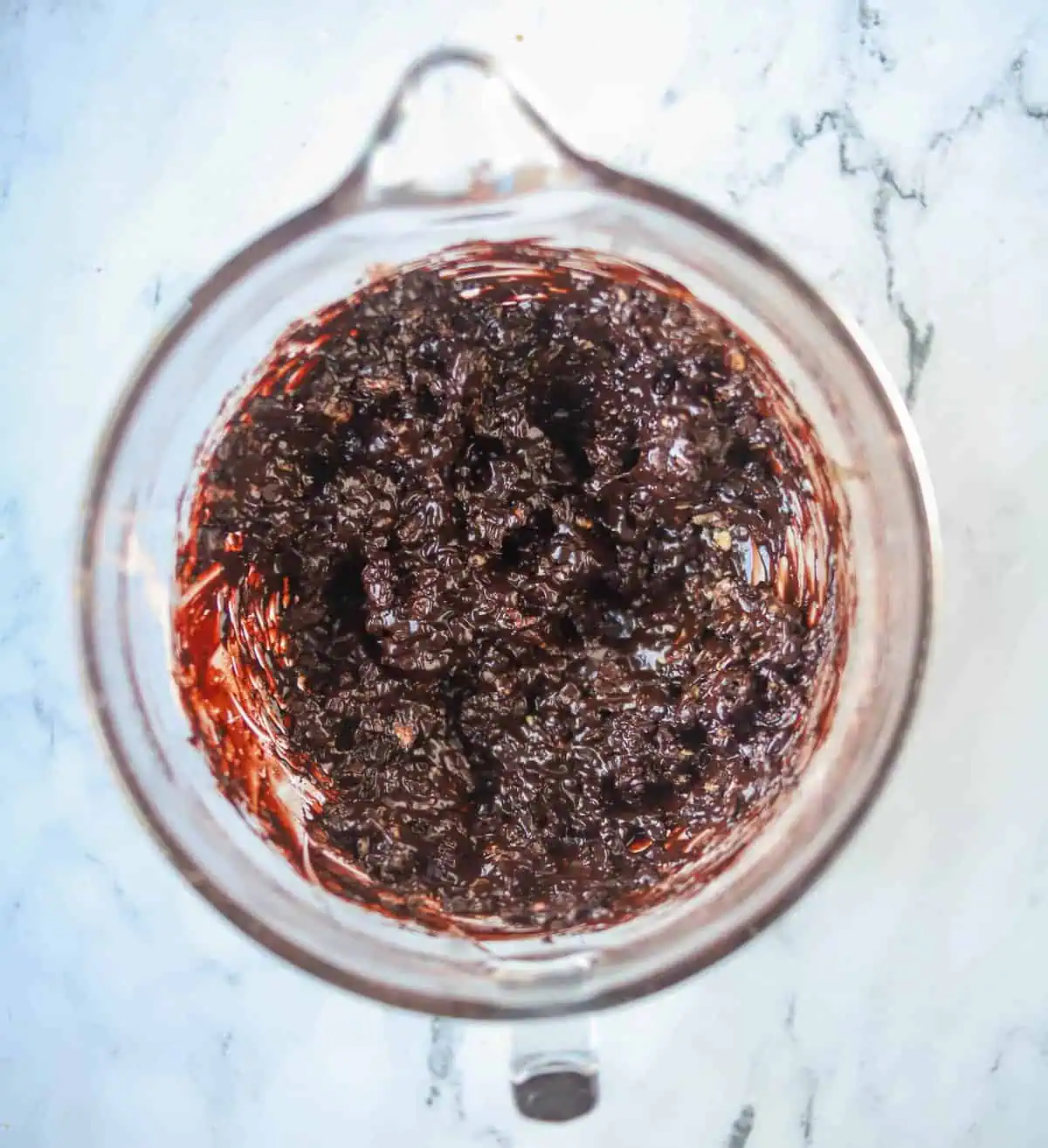 chocolate walnut cookie batter in a bowl