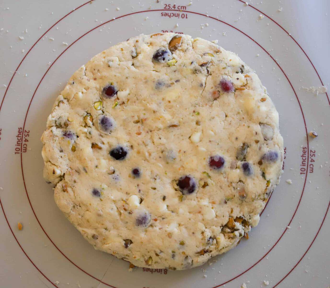 pistachio scone dough shaped into a circle