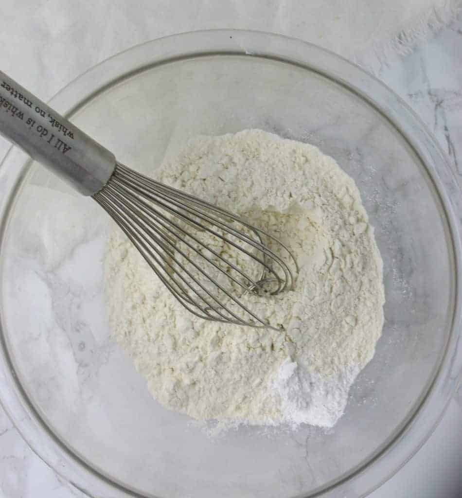 dry ingredients in a bowl with a whisk