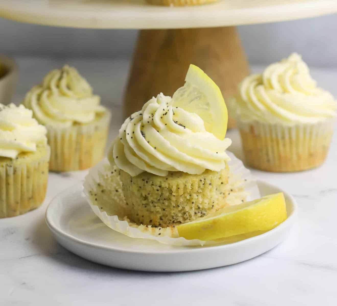 lemon cupcake topped with lemon buttercream frosting