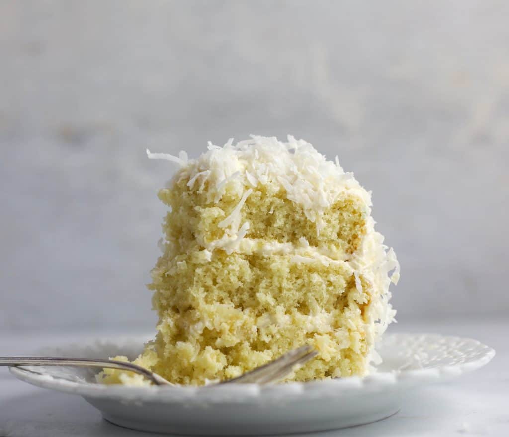 The Best Coconut Cake With Icing Ever! (Easy + Moist)