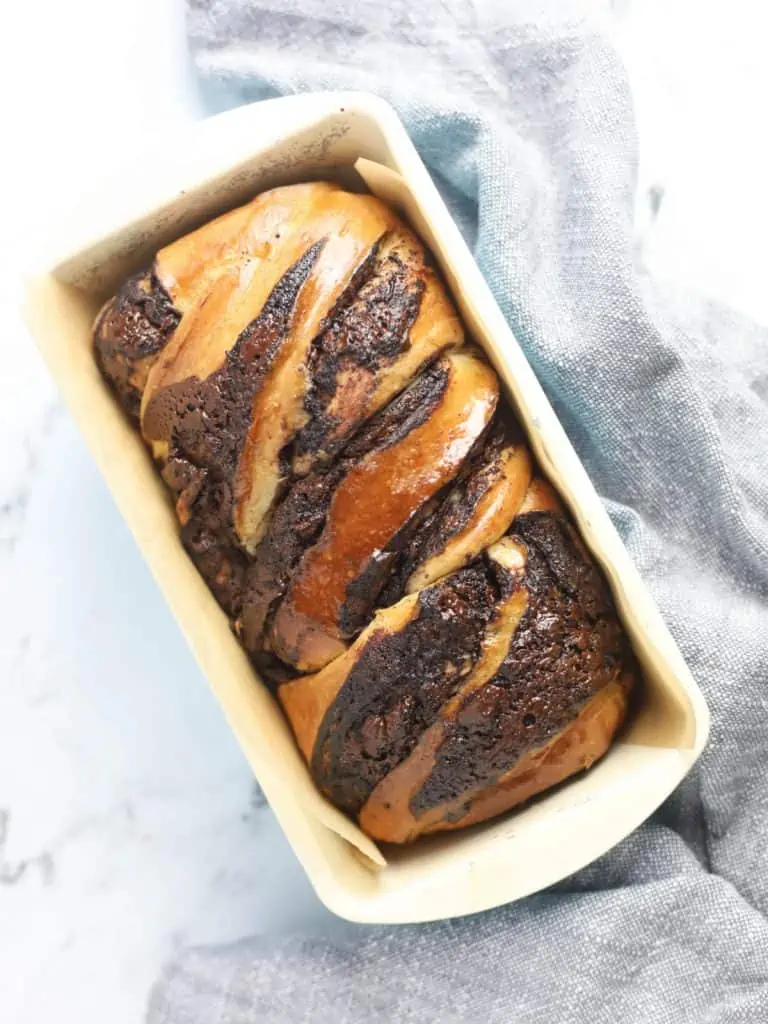 sourdough chocolate babka in a loaf pan