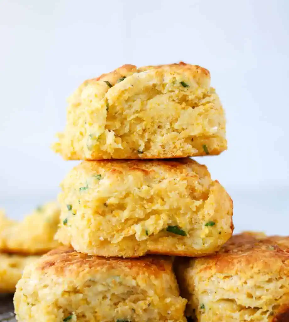 a stack of cheddar cornmeal biscuits